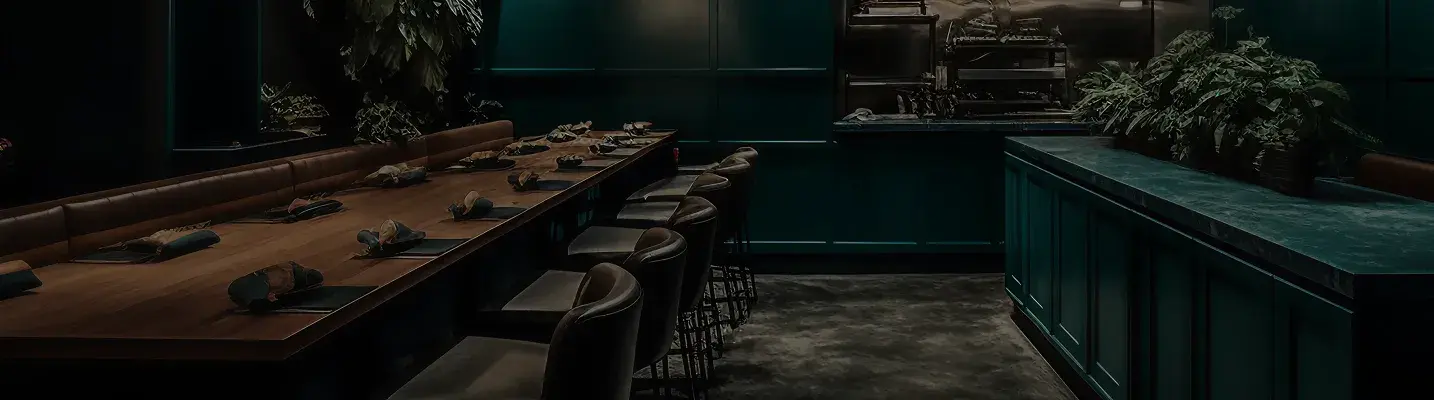 Dark green booth seating by hospitality consultants Dubai